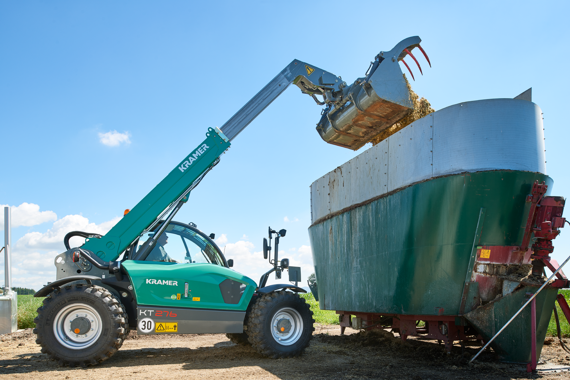 The Kramer telehandler KT276 while loading a container.