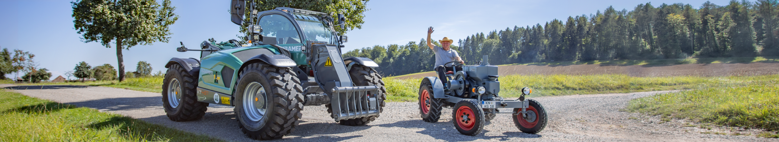 Kramer telescopic handler and tractor on the road