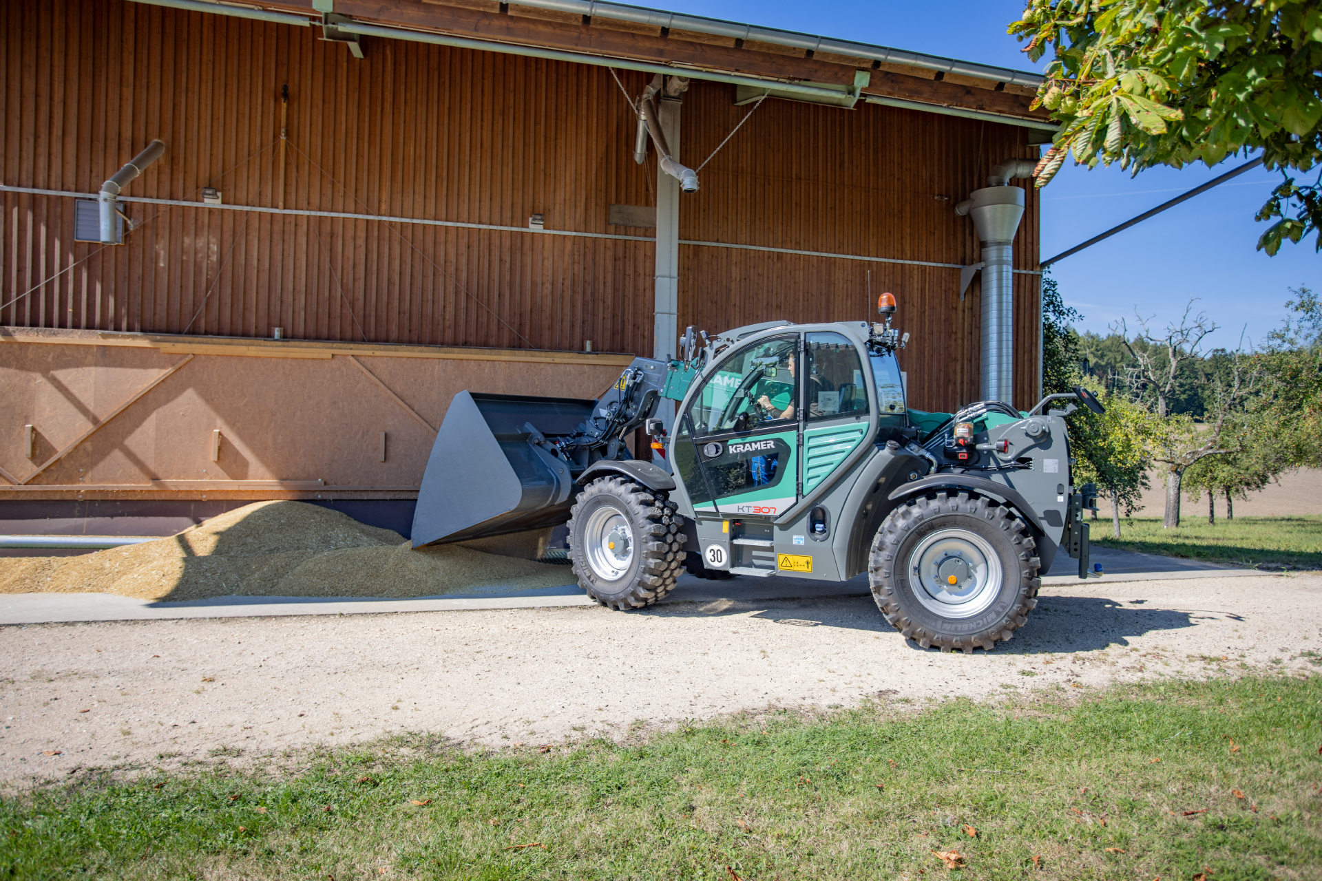 The Kramer telehandler KT307 while working with corn.