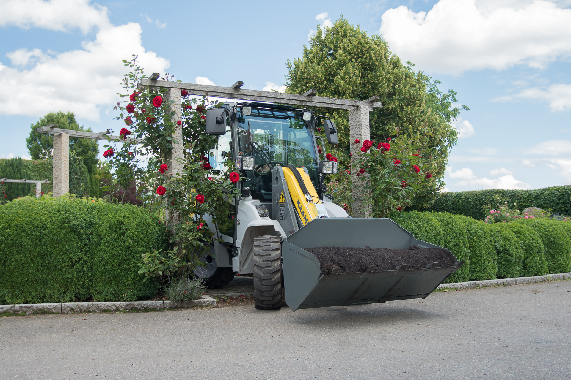 The compact 5035 while transport work in gardening and landscaping.
