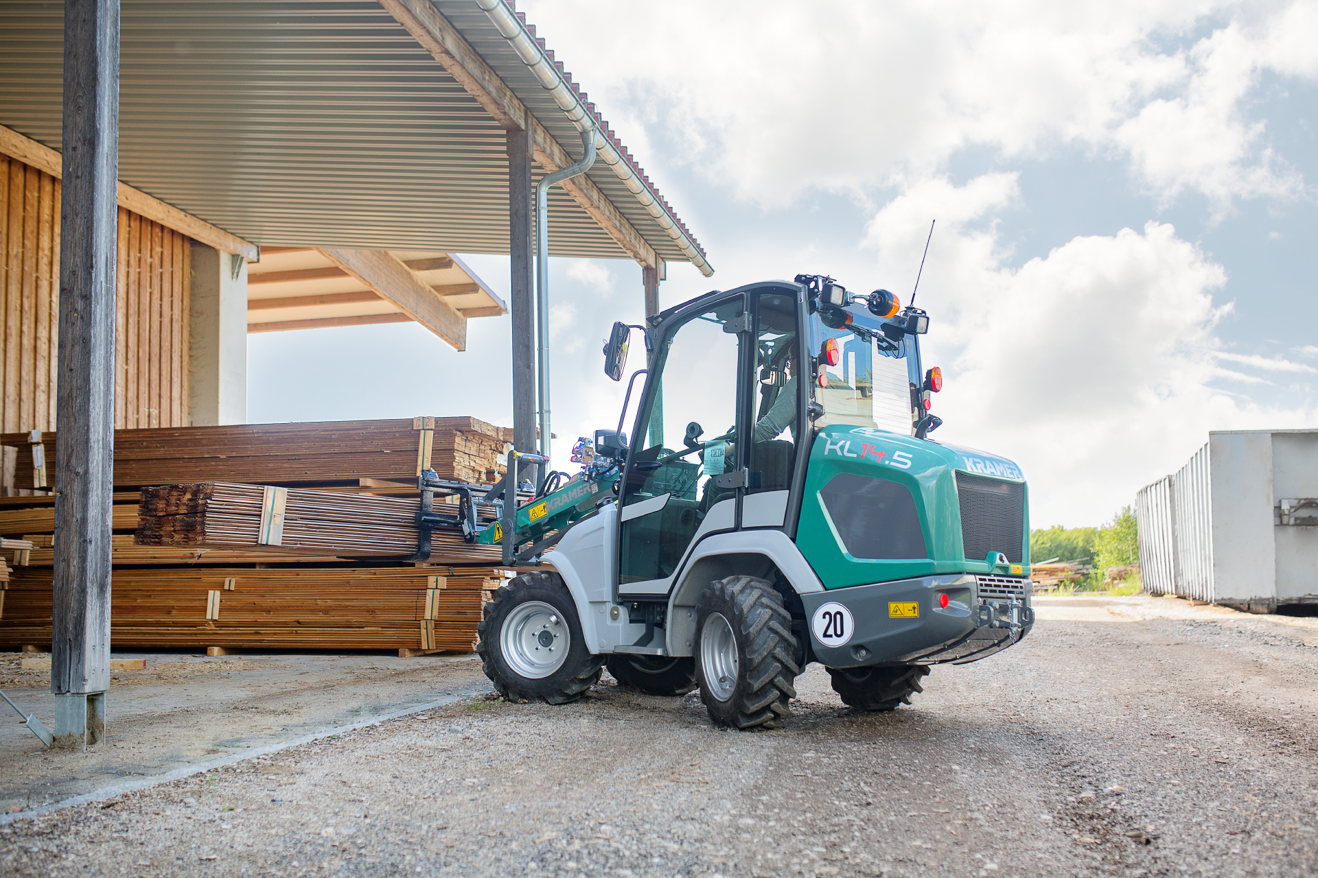 The compact KL14.5 while transporting wood.