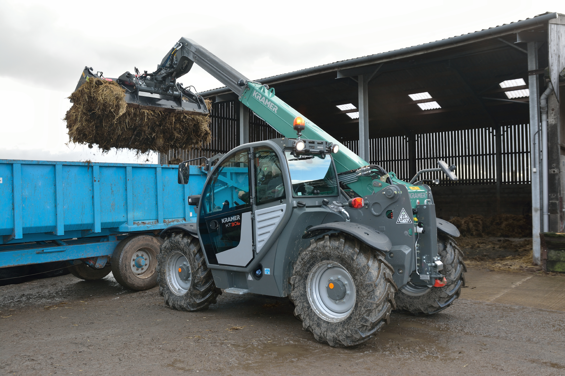 The Kramer telehandler KT306 while loading a container.